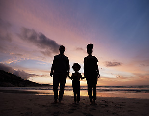 Image showing Shadow, family at beach and holding hands at sunset, bonding or outdoor on mockup space. Silhouette, sea and father, kid and mother at ocean in care, summer holiday and vacation to travel together