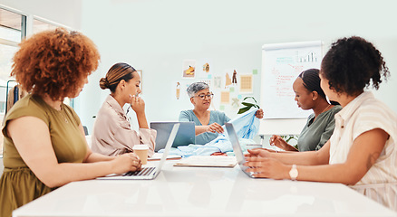 Image showing Creative woman, fashion designer and meeting in team brainstorming, planning or clothing ideas at office. Group of people in retail startup, project plan or discussion in teamwork, design or mission