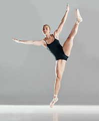 Image showing Balance, ballerina or girl in studio on mockup space for wellness, fitness or creative performance. Art, dancer or woman ballet dancing or training to exercise in practice motion on white background