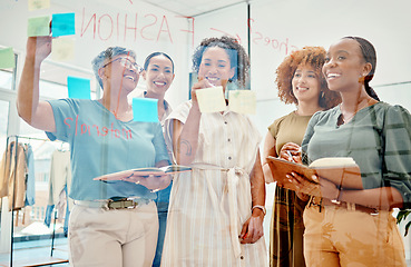 Image showing Happy creative women, writing and meeting in planning, brainstorming or team strategy on glass board at office. Group of employees in startup project plan, agenda or schedule tasks at the workplace