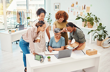 Image showing Business women, fashion designer and laptop with teamwork, planning or brainstorming in office of website launch. Professional creative people in collaboration meeting, design review or happy project