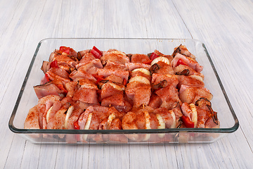 Image showing raw meat on skewers ready for grill