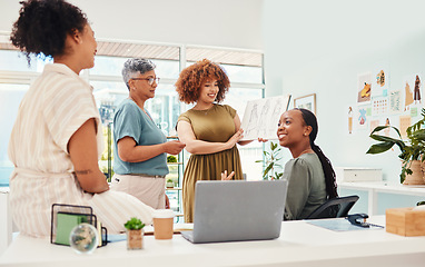 Image showing Small business, designer team and women in discussion for collaboration in fashion industry. Group of people in a modern office for creativity, brainstorming and ideas in meeting at a startup company