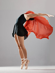 Image showing Ballet, woman or dancer training, fabric and performance on a white studio background. Female performer, ballerina and girl with technique, practice routine and elegant art with creative or exercise