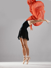 Image showing Ballet, woman or dancer with fabric, performance or prepare for a show on white studio background. Female performer, ballerina or artist with technique, practice routine and training with fitness