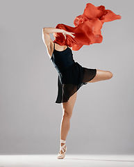 Image showing Fashion fabric, ballerina or woman in studio on mockup space for wellness, freedom or creative performance. Red cloth, dancer or girl ballet moving or dancing in training exercise on white background