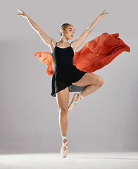 Image showing Ballet, artist and woman with pose, training or elegant art with performance on white studio background. Female performer, ballerina or dancer with technique, practice routine and creative person