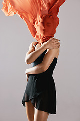 Image showing Fashion, fabric and wind with a model in studio on a gray background for runway or magazine cover style. Abstract, textile and hidden face with a trendy young woman posing in a material outfit