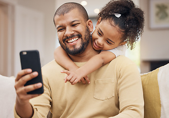 Image showing Home, father and girl with a smile, selfie and hug with social media, family and loving together. Embrace, parent or female child on a sofa, profile picture or memory with love or bonding in a lounge