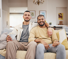 Image showing Happy, smile and portrait of a gay couple on a sofa relaxing with a cup of coffee in the living room. Love, bonding and young lgbtq men with a latte sitting together in the lounge at their home.