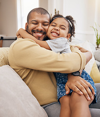 Image showing Happy, love and girl hugging her father while relaxing on a sofa in the living room together. Smile, care and child bonding, embracing and sitting with her young dad in the lounge of their home.