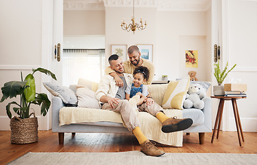 Image showing Gay, happy family and a child on a sofa at home with love, care and safety in a lounge. Lgbtq men, adoption and parents with a foster girl kid together on a couch for happiness, bonding and to relax