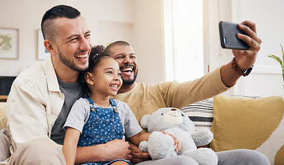 Image showing Gay family, selfie and child on home sofa for video call, social media and internet. Lgbt men or parents with kid together on a couch for streaming, profile picture and adoption memory with happiness