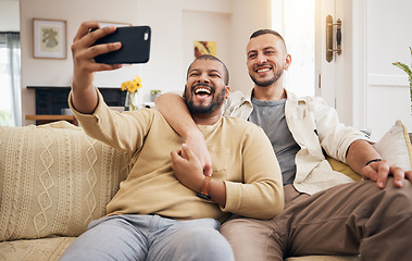 Image showing Men, gay couple and funny selfie in home living room, bonding and laughing together. People, lgbtq and profile picture, happy memory and smile on social media in love, care and hug on sofa in lounge