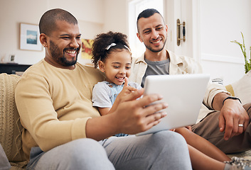 Image showing Gay family, tablet and child on home sofa for learning, communication and education on internet. Adoption, lgbt men or parents with a happy kid and technology for streaming movies, games and videos