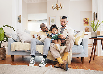 Image showing Gay parents on a couch, girl and reading book with a smile, home and education with bonding, relax and weekend break. Fathers, female child and kid with lgbtq, storytelling and fairytale in a lounge