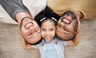 Image showing Portrait, gay dad and blended family with a girl lying together on the floor of the home for adoption from above. LGBT love, children or kids and a daughter with her happy foster parents in the house