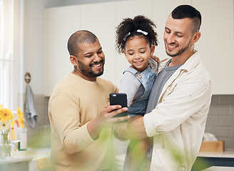 Image showing Selfie, blended family and a girl with her gay parents in the kitchen together for a social media profile picture. Adoption photograph, smile or love and a daughter with her lgbt father in the home