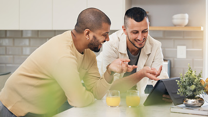 Image showing Smile, streaming and a gay couple with a tablet in a kitchen for a funny video or social media. Happy, house and lgbt men with technology for communication or reading an online chat together