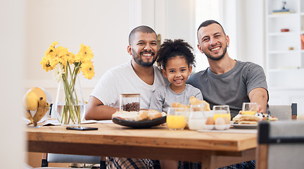 Image showing Gay men, portrait and family at breakfast together in the dining room of their modern house. Smile, bonding and happy girl child eating a healthy meal for lunch or brunch with her lgbtq dads at home.