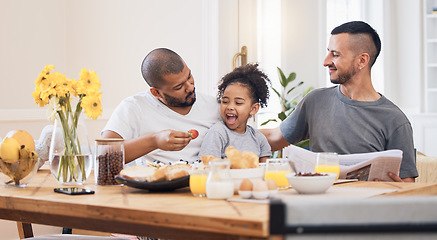 Image showing Gay couple, breakfast and parents feeding kid meal, food or strawberry for morning wellness, nutrition and development support. Healthy family, home fruit and homosexual father smile for hungry child