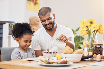 Image showing Home, breakfast and father with girl, cereal and help with milk, nutrition and family with food. Male parent, child and kid with healthy meal, start the day and dad with support, hungry and happy