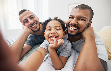 Image showing Gay, family and selfie portrait of child in home bedroom, bonding and fun together. Face of men, lgbtq parents and girl on bed in adoption, foster and profile picture, happy memory and interracial