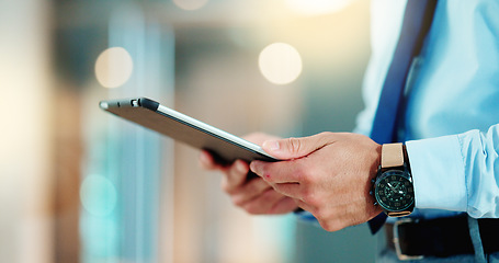 Image showing Business man browsing on a digital tablet in an office. Closeup on hands of a corporate professional and expert staying organized with apps. Scrolling on the internet and planning successful ideas