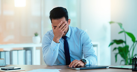 Image showing Stressed Sales manager is angry about a bad sales report after a marketing campaign. Frustrated executive is upset and annoyed about advertising problem and is under real pressure to hit his deadline