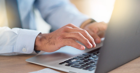 Image showing Lawyer sending emails on a laptop while working in a modern office. Closeup of advocate or legal assistant researching online. Searching for information while preparing for a case