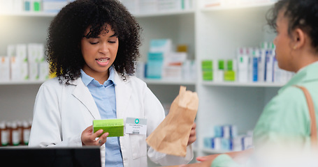 Image showing Concerned pharmacist assisting an upset and angry customer in a local pharmacy. Female client returning medication and complaining about an allergic reaction after taking prescription medicine