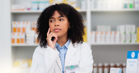 Image showing Medical Professional working at chemist ready to give great healthcare customer service to sick patients. Happy female nurse happy to help people get medicine treatment at her pharmacy retail store