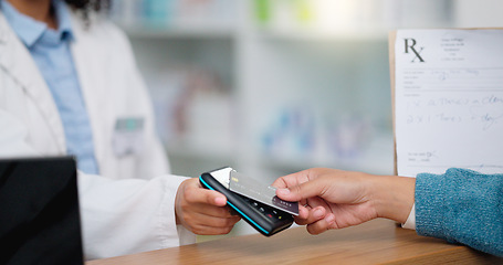 Image showing Closeup customer hands using ebanking credit card to pay on contactless nfc machine to collect prescription medication from pharmacist. Man tapping or scanning electronic device for pharmacy medicine