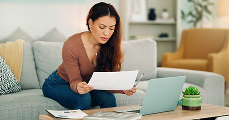 Image showing Woman, paper and laptop in living room on sofa working on project, assignment or task for college or business. Student, girl and home to study, for test or exam at university with handheld movement