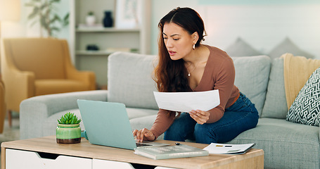 Image showing Woman, paper and laptop in living room on sofa working on project, assignment or task for college or business. Student, girl and home to study, for test or exam at university with handheld movement