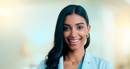 Image showing Satisfied, confident entrepreneur doing an online training for a remote, distance job. Closeup face portrait of a successful business woman standing and smiling against a bokeh, copyspace background.