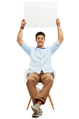 Image showing Endorsing your company in comfort. A handsome young man holding up copyspace.