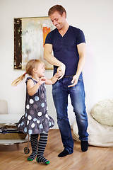 Image showing Father-daughter bonding. Shot of a young father bonding with his little daughter.