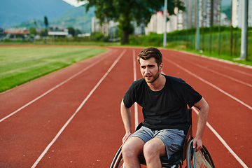 Image showing A person with disability in a wheelchair training tirelessly on the track in preparation for the Paralympic Games