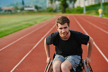 Image showing A person with disability in a wheelchair training tirelessly on the track in preparation for the Paralympic Games