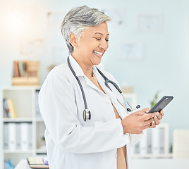 Image showing Happy, doctor and woman with phone reading communication, contact or social media post or medical meme. Medicine, mobile app and happy mature healthcare worker on internet, website of health blog