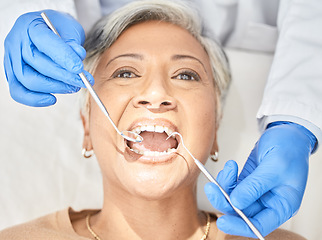 Image showing Healthcare, consulting and teeth with woman at dentist for oral hygiene, cleaning and medical. Exam, dental checkup and smile with mouth of mature patient in office for filling, surgery and treatment