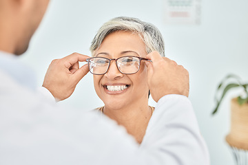 Image showing Eye care, glasses and senior patient with doctor, optometry and frame choice with help and people at clinic. Wellness, health and prescription lens, woman and optometrist with trust and eyewear