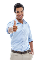 Image showing An enthusiastic approval. Studio shot of a young man giving the thumbs up sign isolated on white.