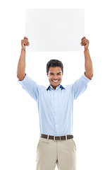 Image showing How do you like this idea. Studio shot of a young man holding a blank card for copyspace isolated on white.