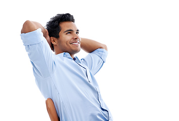 Image showing Hes one confident character. Studio shot of a handsome young man sitting in a studio isolated on white.