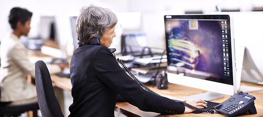 Image showing Just another busy day in the office. Cropped shot of two businesswomen working in an office.