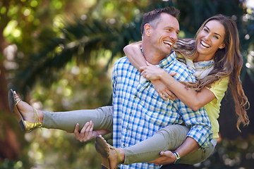 Image showing I love making her smile. Portrait of an affectionate couple outside in the summer sun.