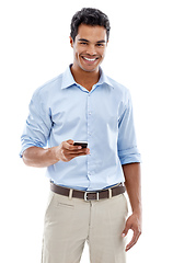 Image showing Hes always making plans. Studio shot of a young man text messaging isolated on white.