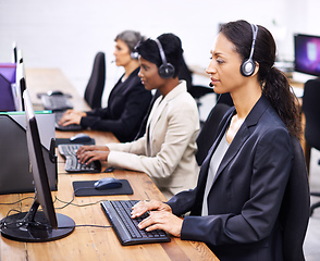 Image showing Theyve always provided great service. Cropped shot of three female call center representatives wearing headsets.